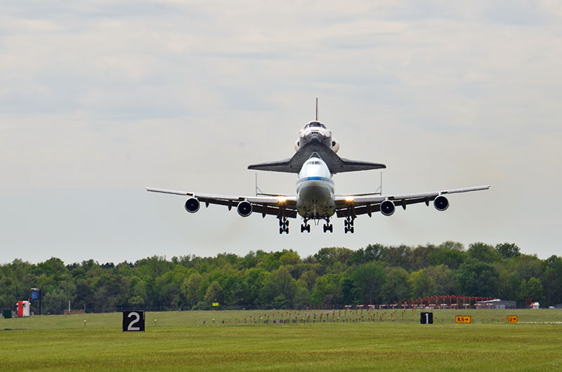 Space shuttle Discovery lands in Washington for Smithsonian display