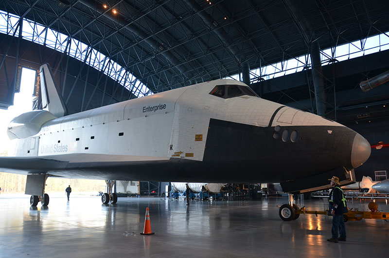 Final wheels stop: Space shuttle Discovery enters the Smithsonian