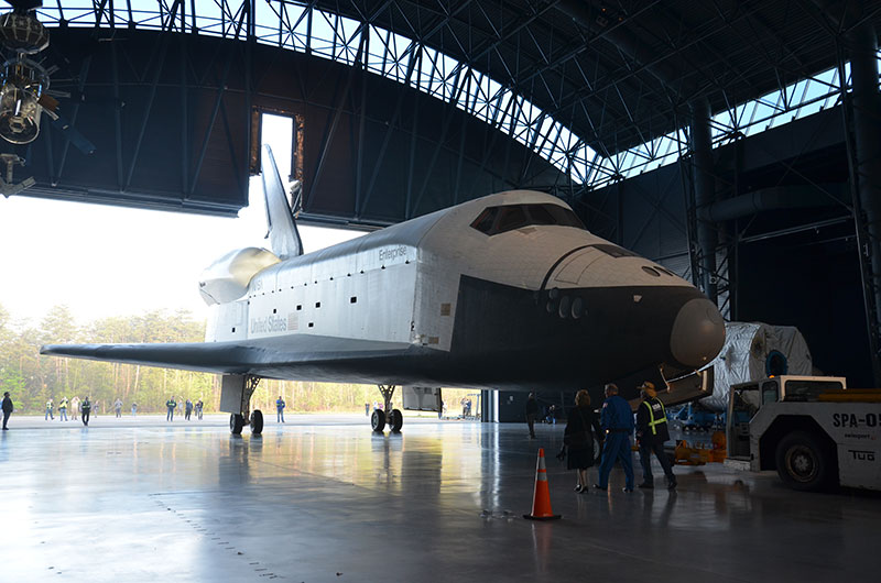 Final wheels stop: Space shuttle Discovery enters the Smithsonian