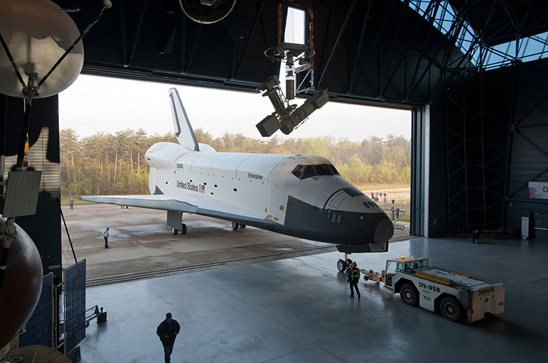 Final wheels stop: Space shuttle Discovery enters the Smithsonian