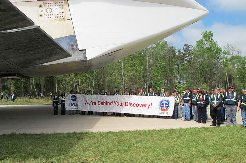 Final wheels stop: Space shuttle Discovery enters the Smithsonian