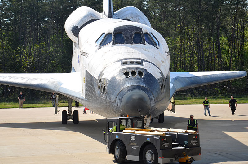 Final wheels stop: Space shuttle Discovery enters the Smithsonian