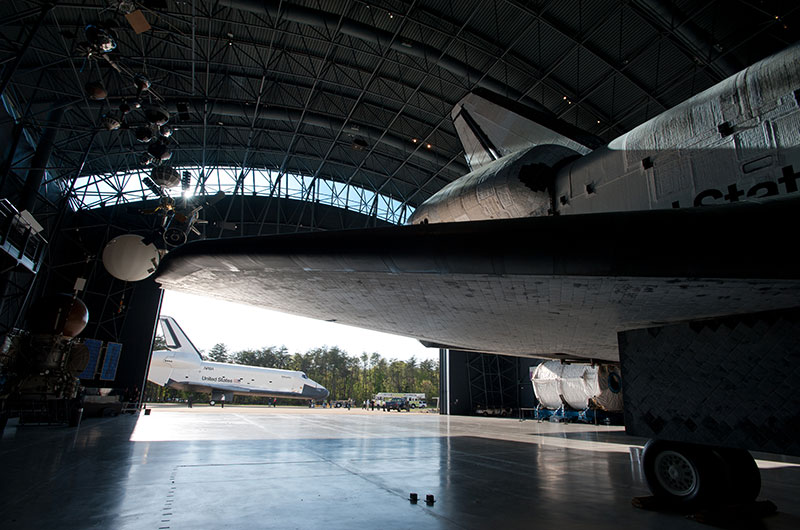 Final wheels stop: Space shuttle Discovery enters the Smithsonian