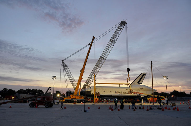 Space shuttle Enterprise hoisted off jumbo jet in New York