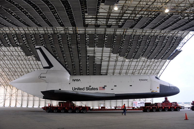 Space shuttle Enterprise hoisted off jumbo jet in New York