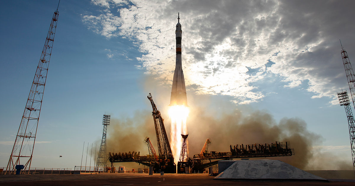 International crew lifts off for space station on anniversary of