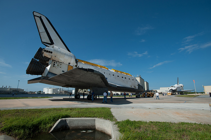 Trading places, space shuttles meet nose-to-nose for a final time