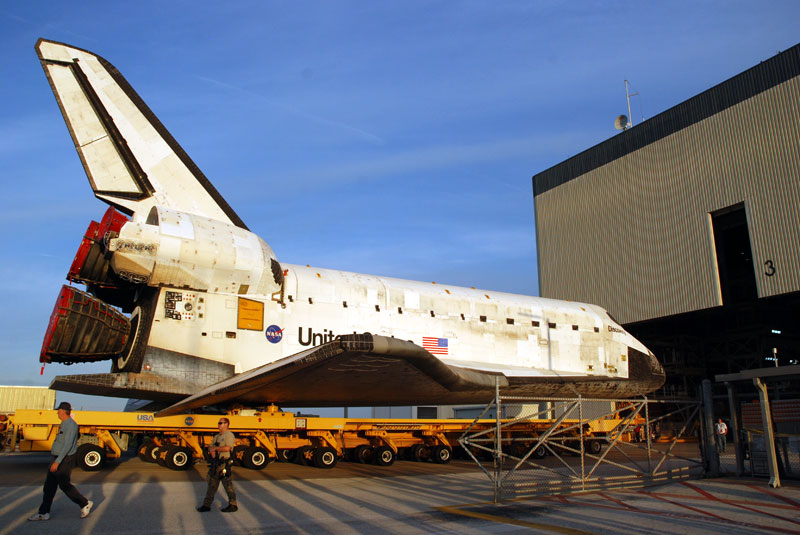 Space shuttle Discovery departs hangar for final flight