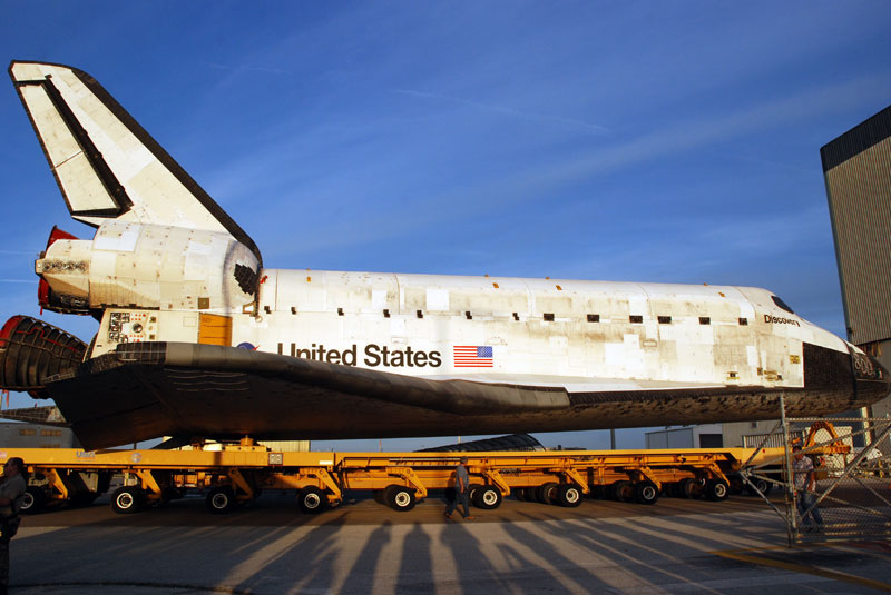 Space shuttle Discovery departs hangar for final flight