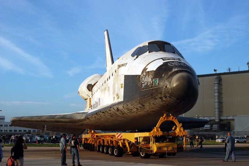 Space shuttle Discovery departs hangar for final flight