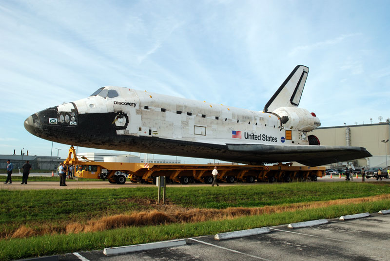 Space shuttle Discovery departs hangar for final flight