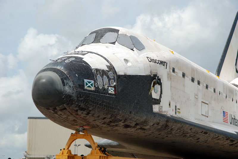 Space shuttle Discovery departs hangar for final flight