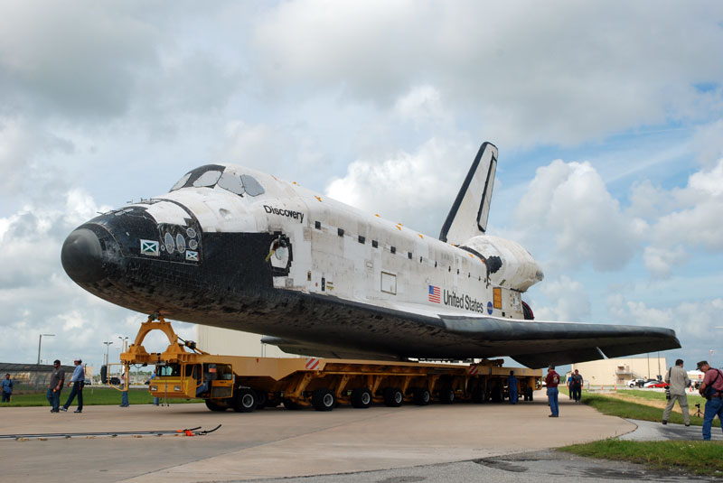 Space shuttle Discovery departs hangar for final flight