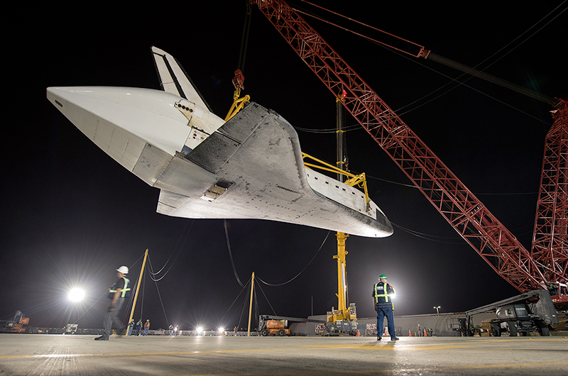 Shuttle Endeavour hoisted off jet for road trip to L.A. museum