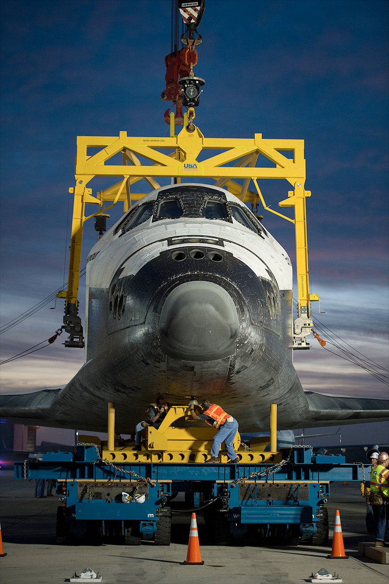 Shuttle Endeavour hoisted off jet for road trip to L.A. museum