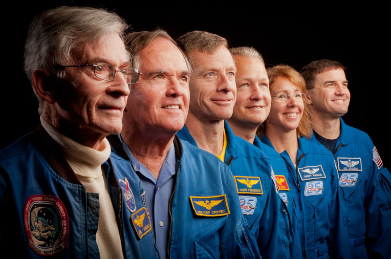 First, last space shuttle crews meet for 'bookend' photos